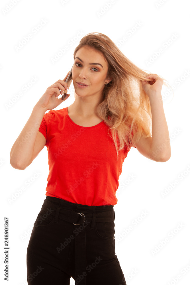 Beautiful young woman in red t shirt speak on a smart phone isolated over white background - phone chat Beautiful young woman in red t shirt speak on a smart phone isolated over white background - phone chat