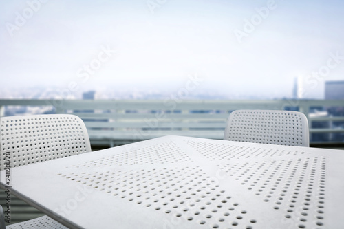 white table background and city landscape 
