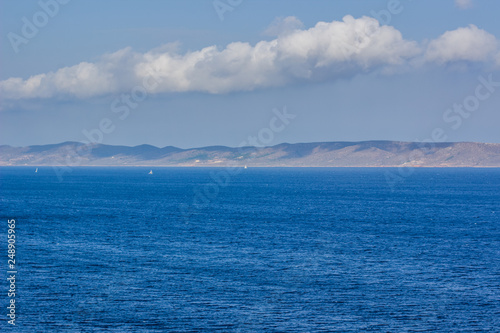 wallpaper pattern photography of sea water surface foreground and land ridge line background south scenic landscape with copy space for your text or inscription   © Артём Князь