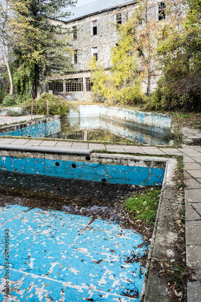 Swimming pool area of Berengaria abandoned hotel in mountain region of Trodos, Cyprus