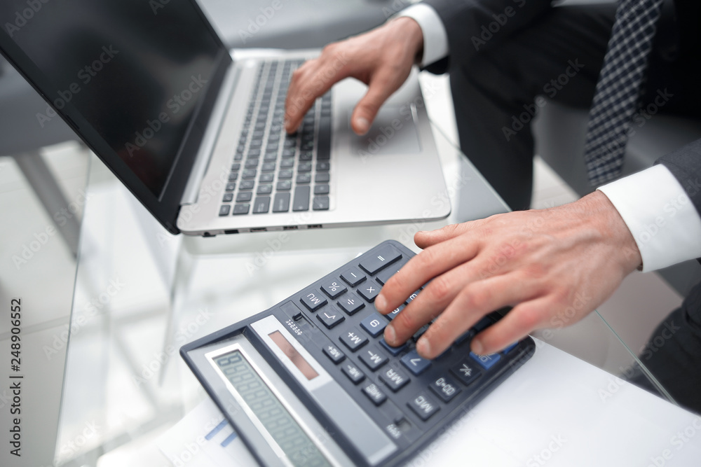 close up.businessman works with financial data close up.businessman works with financial data