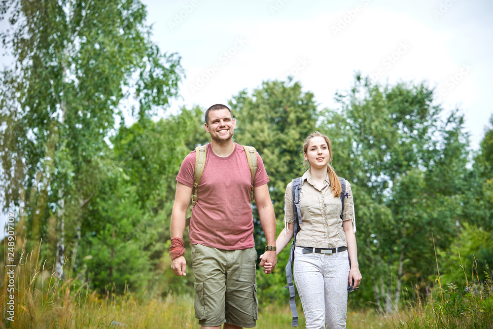 two travelers in the forest