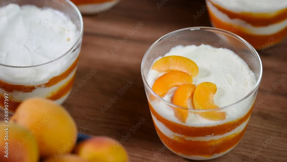 Trifle with apricot jam and cream. Trifle with apricot jam and cream.
