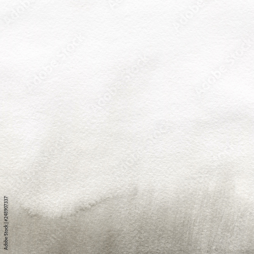 Gold luxury ink and watercolor textures on white paper background. Paint leaks and ombre effects. Hand painted abstract image.