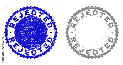 Grunge REJECTED stamp seals isolated on a white background. Rosette seals with distress texture in blue and gray colors. Vector rubber stamp imitation of REJECTED title inside round rosette.