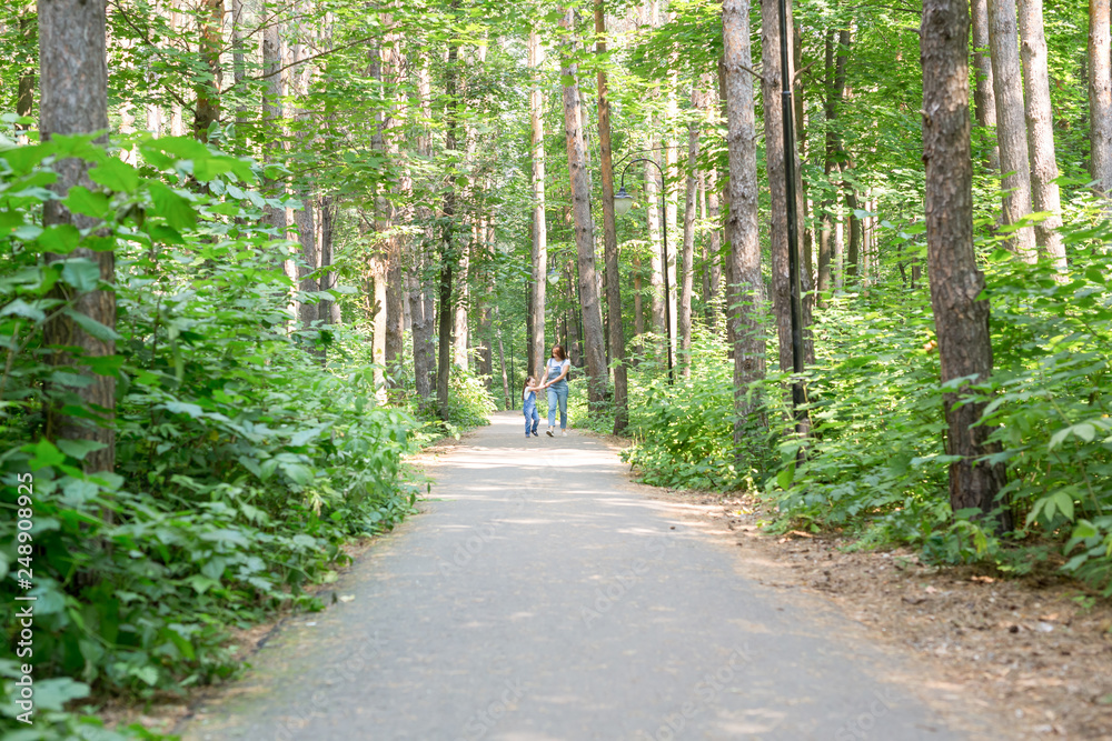 Family and nature concept - Mother and daughter spend time together outdoor Family and nature concept - Mother and daughter spend time together outdoor