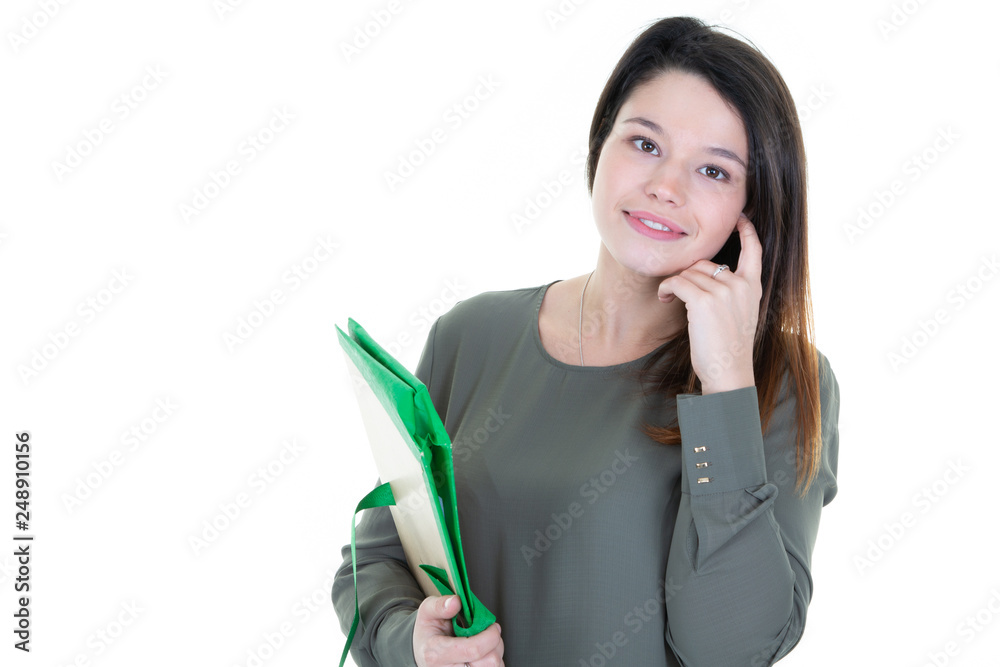 Young student woman holding folder isolated on white background Young student woman holding folder isolated on white background