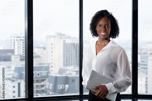 Portrait of a black Brazilian business woman in a suit