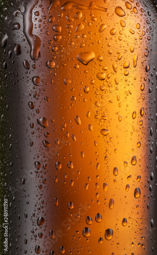 Misted glass of beer bottle. Close up shot.