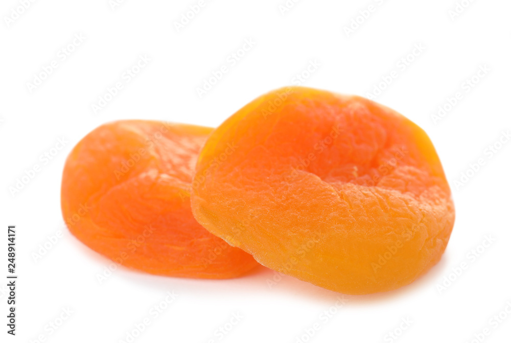 Tasty apricots on white background. Dried fruit as healthy food Tasty apricots on white background. Dried fruit as healthy food