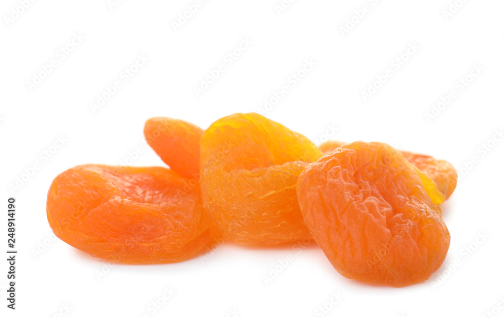 Tasty apricots on white background. Dried fruit as healthy food Tasty apricots on white background. Dried fruit as healthy food