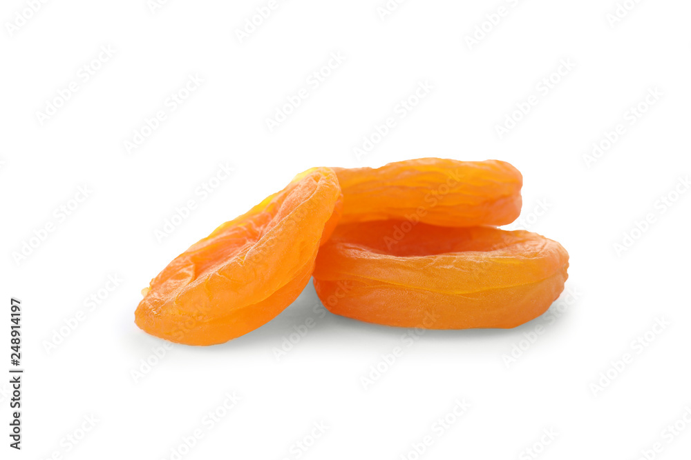 Tasty apricots on white background. Dried fruit as healthy food Tasty apricots on white background. Dried fruit as healthy food