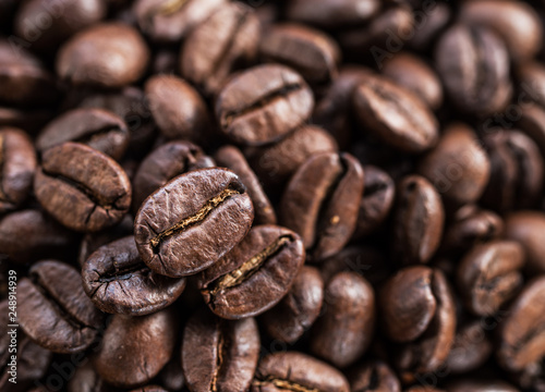Roasted coffee beans. Food and drink background. Top view.