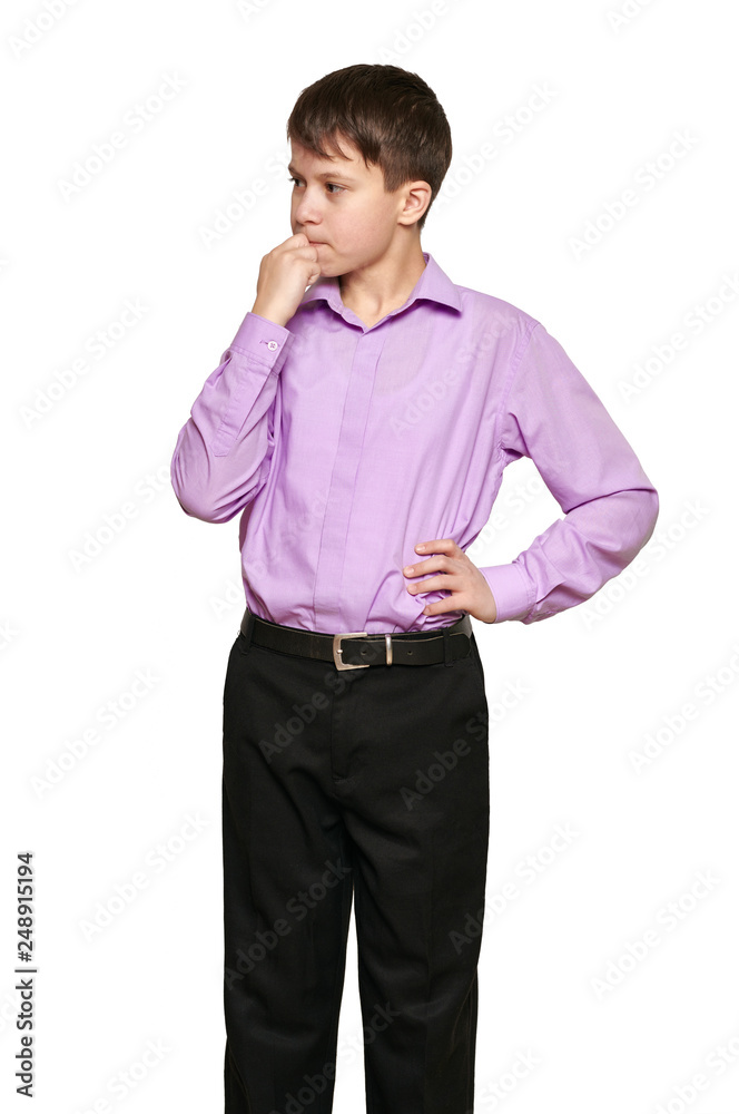 Boy posing on white background, black trousers and purple shirt Boy posing on white background, black trousers and purple shirt