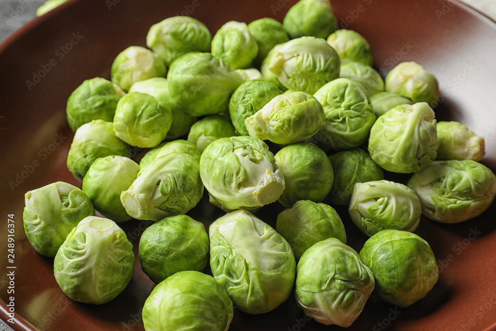 Tasty fresh Brussels sprouts on plate, closeup Tasty fresh Brussels sprouts on plate, closeup
