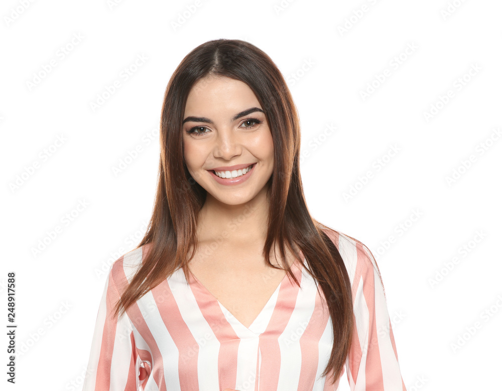 Portrait of beautiful smiling woman in stylish clothes on white background