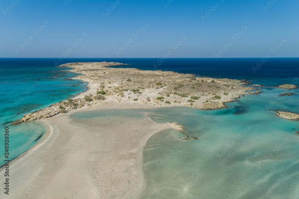 Elafonissi Lagoon in Greece. Sandy island and blue clear sky.