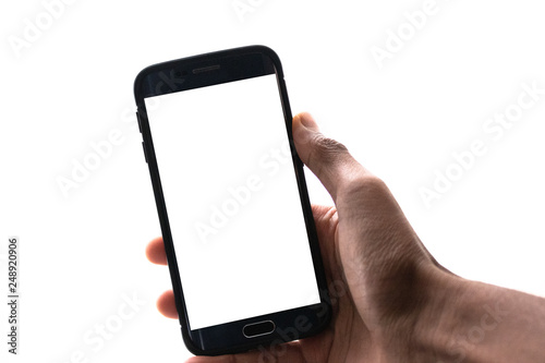 Man hand holding the black smartphone with big blank screen and modern frame less design - isolated on white background angled position - Image