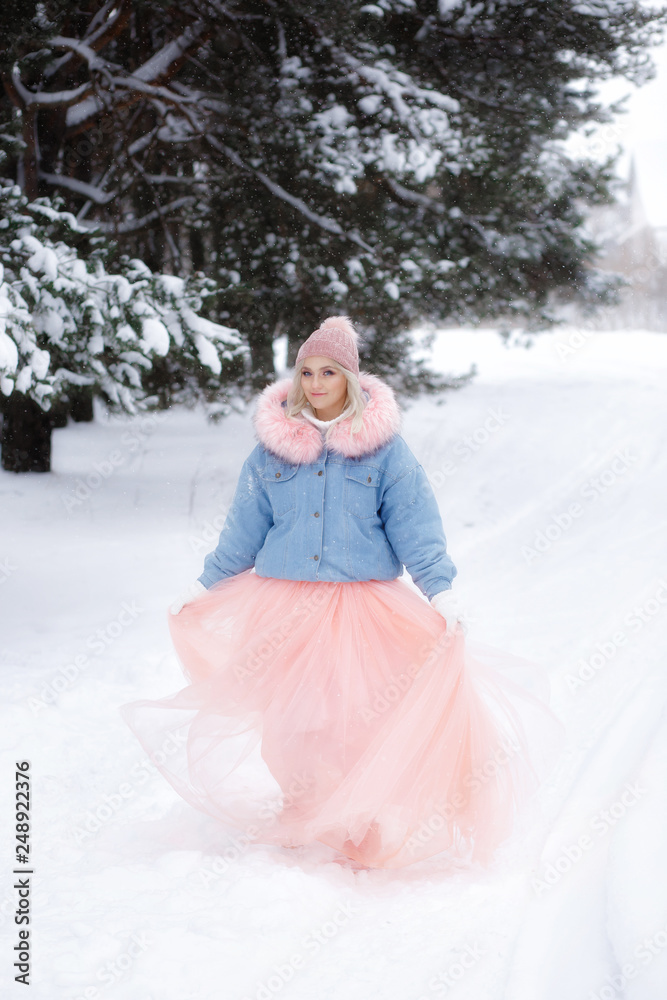 beautiful girl with a dog on a walk in the winter forest. beautiful girl and her pet. beautiful girl with a dog on a walk in the winter forest. beautiful girl and her pet.