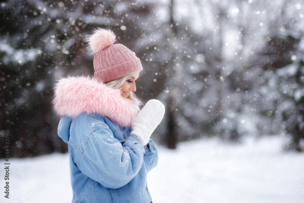 portrait of a beautiful girl on a walk in the winter forest. portrait of a beautiful girl on a walk in the winter forest.