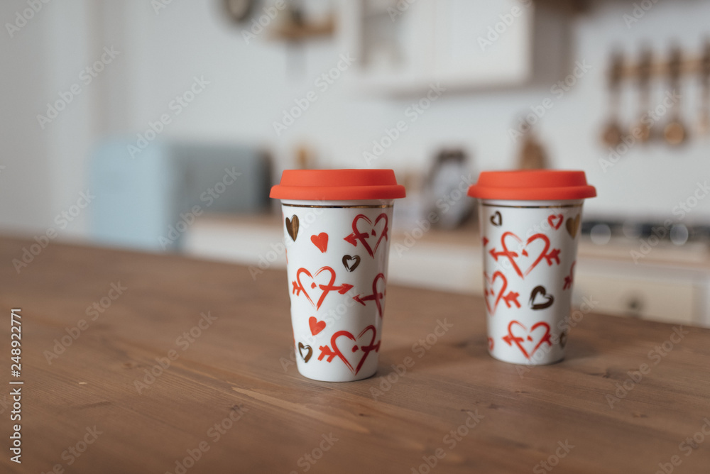 glasses with coffee with the image of red hearts