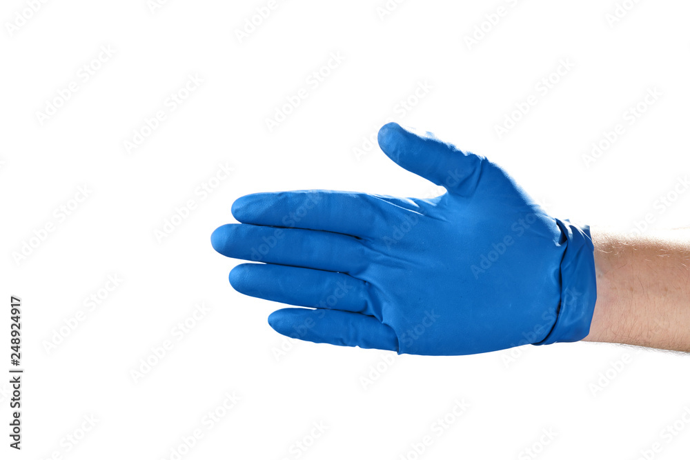 Hand in blue rubber glove showing gesture symbol, on white isolate.