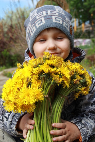 Little boy with flowers