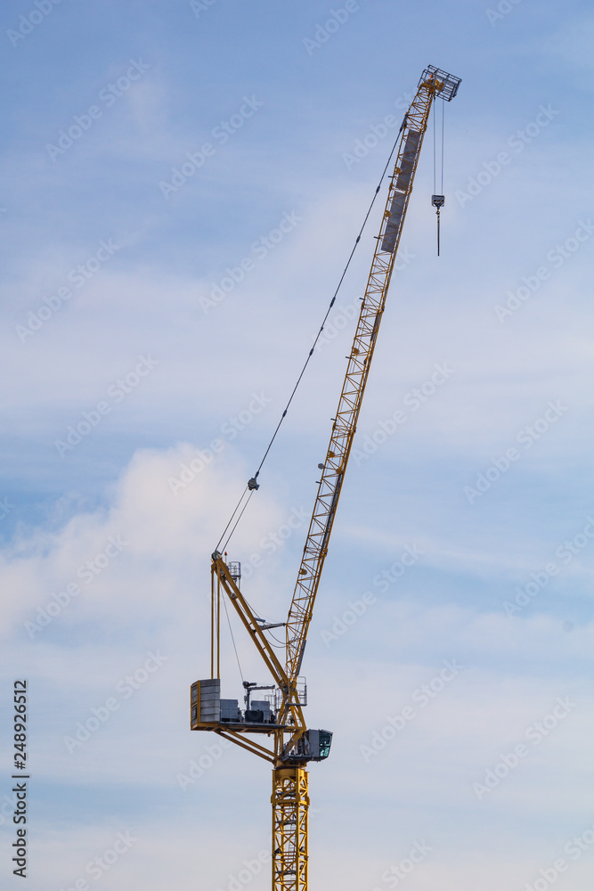 Crane on background of blue sky Crane on background of blue sky