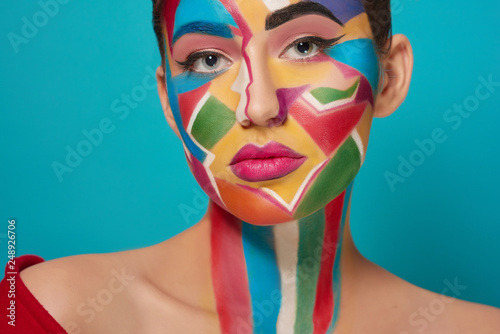 Face of beautiful model with creative make up.