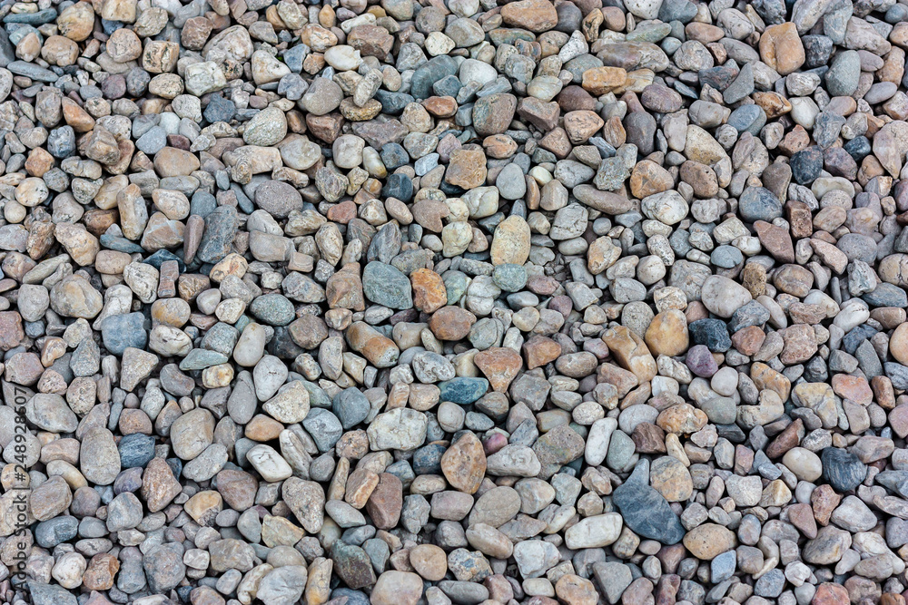 Natural colorful pebble (stones) background texture with copy space. Natural colorful pebble (stones) background texture with copy space.