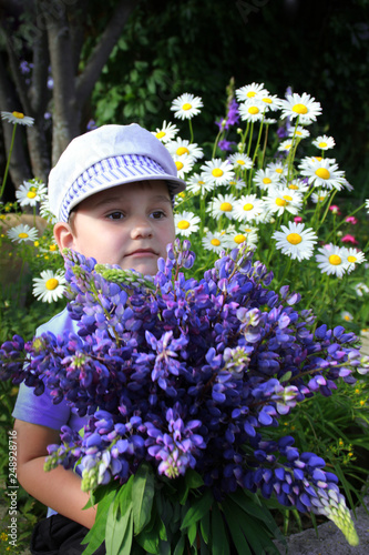 Little boy with flowers