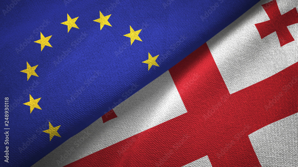 Fototapeta premium European Union and Georgia two flags textile cloth, fabric texture