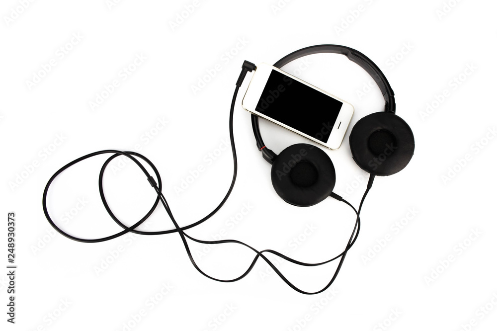 Black studio headphone and Smart phone isolated on white background. Black studio headphone and Smart phone isolated on white background.