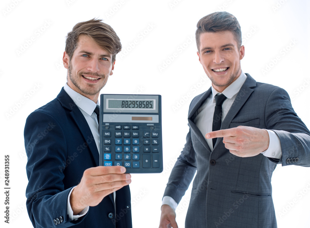 men in suits hold a calculator in office closeup. men in suits hold a calculator in office closeup.