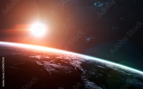 Sunrise over the Earth Planet. Science fiction art. Elements of this image furnished by NASA
