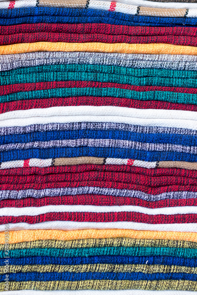 Brazilian handicraft doormat (capacho) stacked from northeast of Brazil . Colorful patterns taken in Feira de Sao Cristovao, Rio de Janeiro, Brazil. 2017 Brazilian handicraft doormat (capacho) stacked from northeast of Brazil . Colorful patterns taken in Feira de Sao Cristovao, Rio de Janeiro, Brazil. 2017