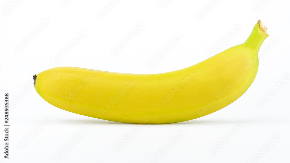 One ripe yellow banana isolated on a white background. One ripe yellow banana isolated on a white background.