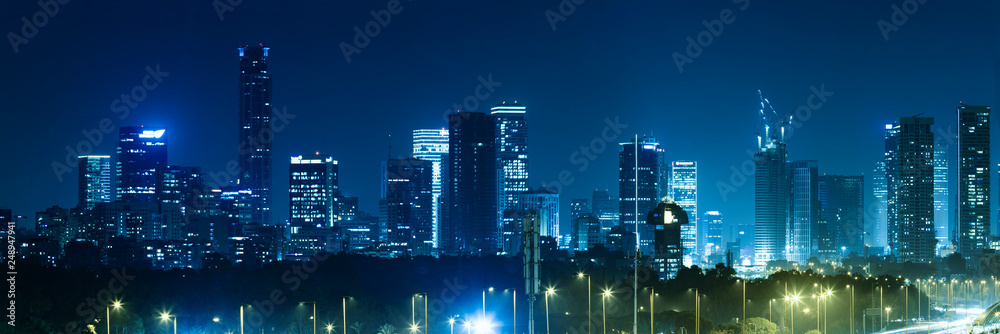 Obraz premium Panorama Of Tel Aviv City And Ayalon Freeway At Night