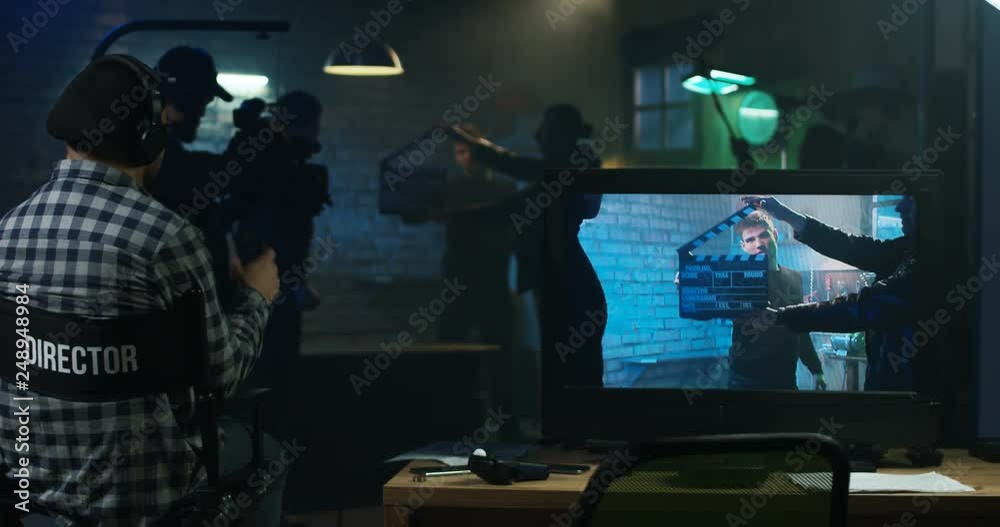 Actors shooting take of fight scene
