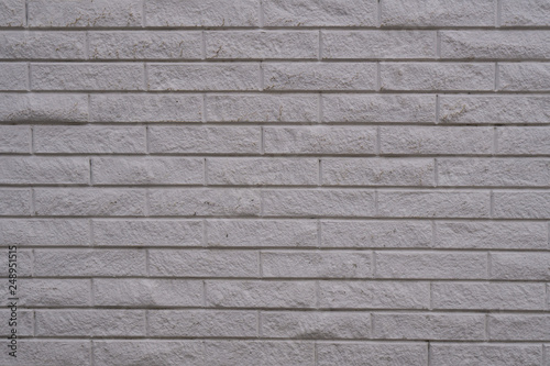 Old white brick stones wall background.Littered brick wall. Bricks wall. White brick wall.