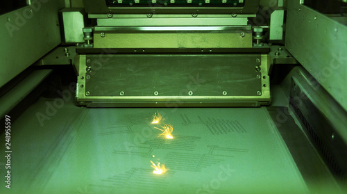 Foto Metal 3D printer (DMLS) - Direct metal laser sintering (DMLS) is an additive manufacturing technique that uses a laser fired into a bed of powdered metal