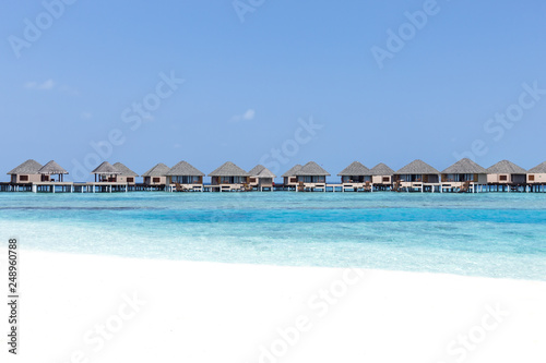 Fototapeta Naklejka Na Ścianę i Meble -  beach with water bungalows at maldivian island