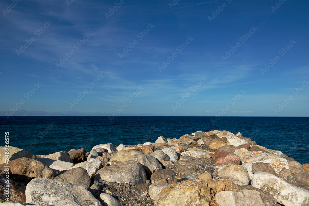 A beautiful seaview with the stones on the beach. A beautiful seaview with the stones on the beach.
