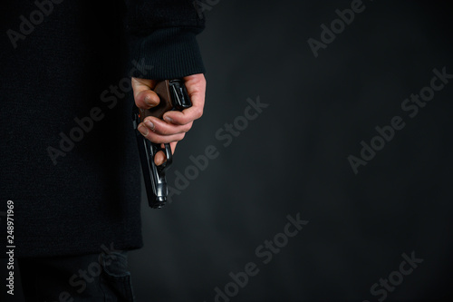 Man with a pistol in the hand