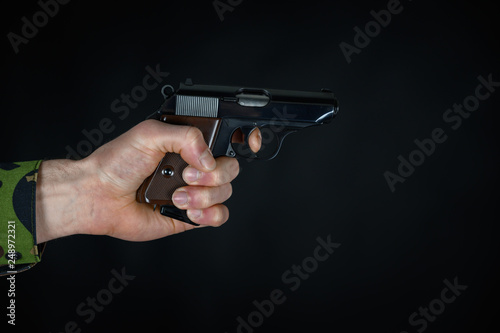 Man holds a pistol