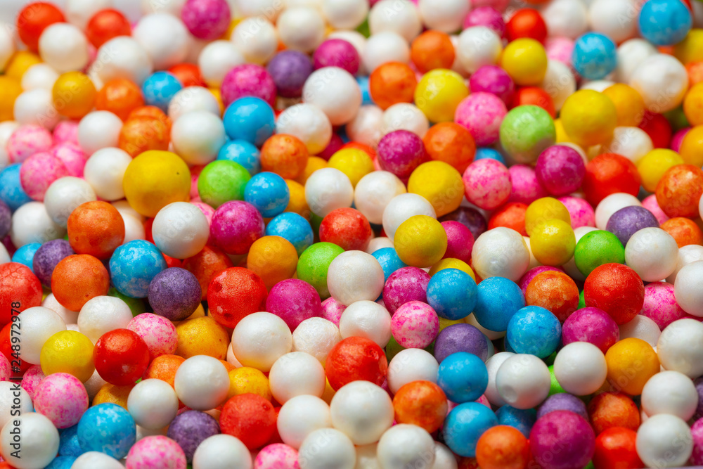 Fototapeta premium Colorful bright background, multi-colored balls. Sweet nice background candy. 