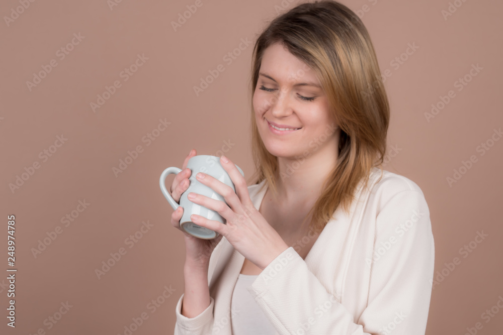 girl with a cup of tea and coffee girl with a cup of tea and coffee