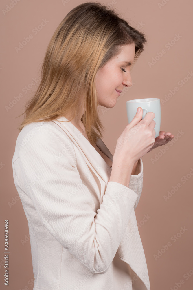 girl with a cup of tea and coffee girl with a cup of tea and coffee
