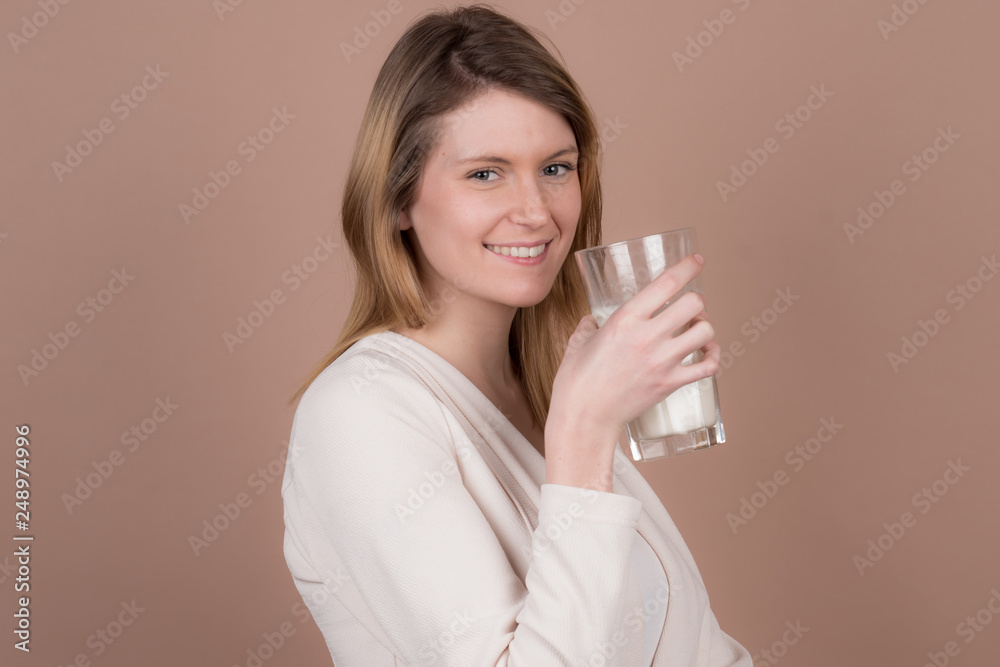 girl drinks milk and is happy girl drinks milk and is happy