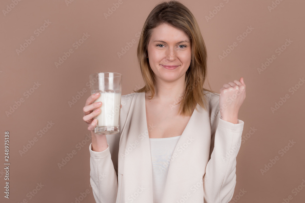 girl drinks milk and is happy girl drinks milk and is happy
